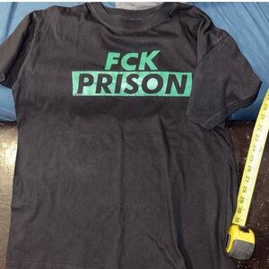 Black Graphic T-Shirt with Green Text